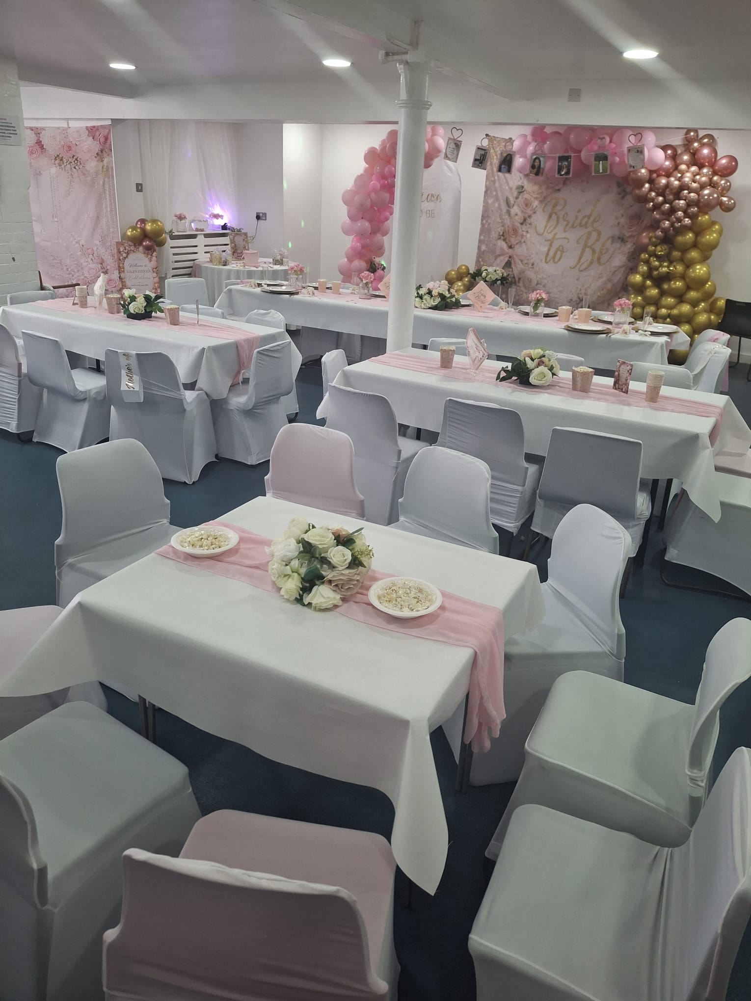 Bridal shower tables dressed in white and soft pink